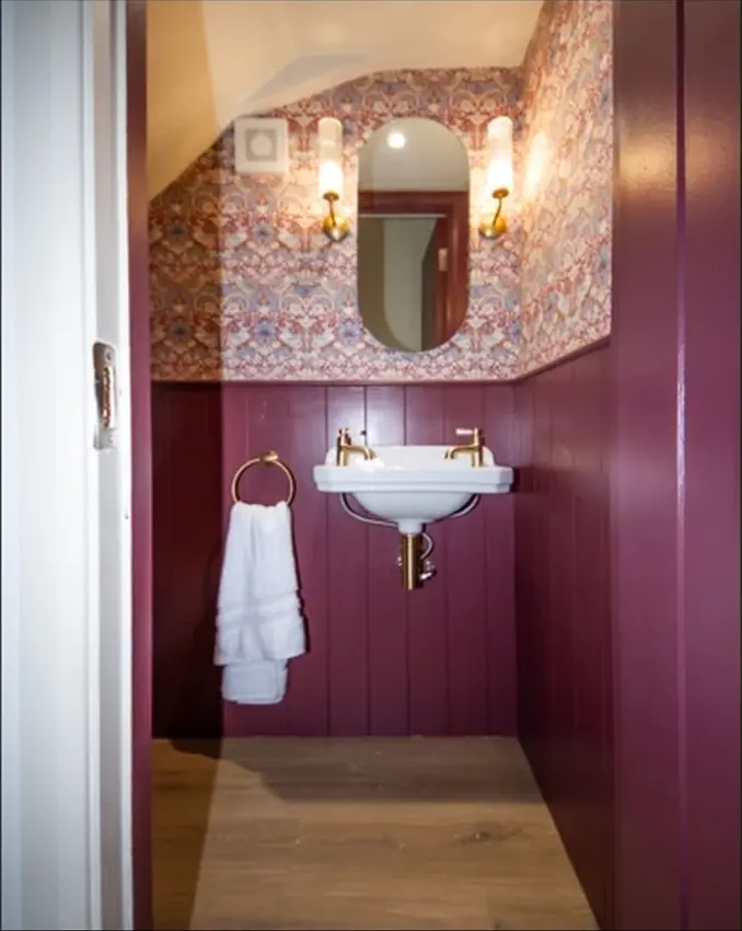 DIY SOS Bray: compact bathroom with patterned wallpaper