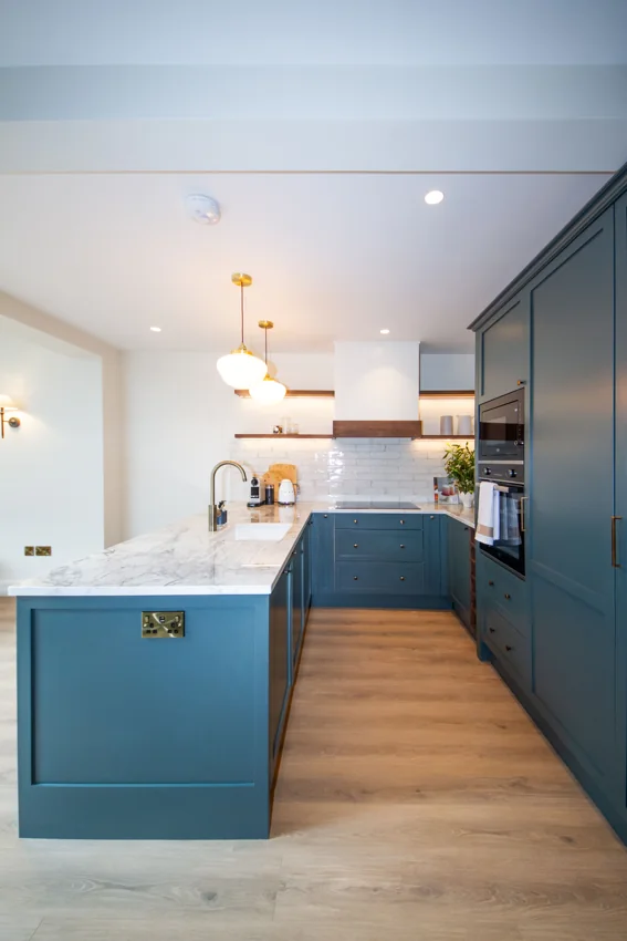 Kitchen cabinetry and the route into the living space