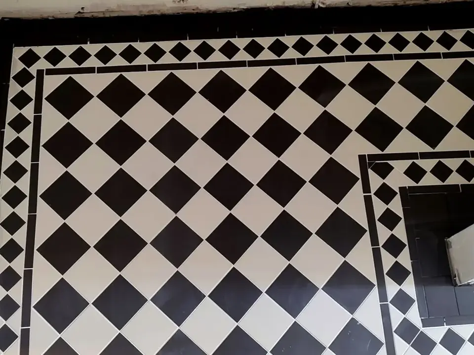 Detailed Victorian tiled floor with border pattern