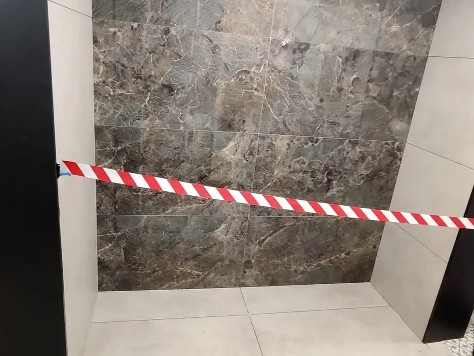 Feature-wall tiling in a bathroom shower area