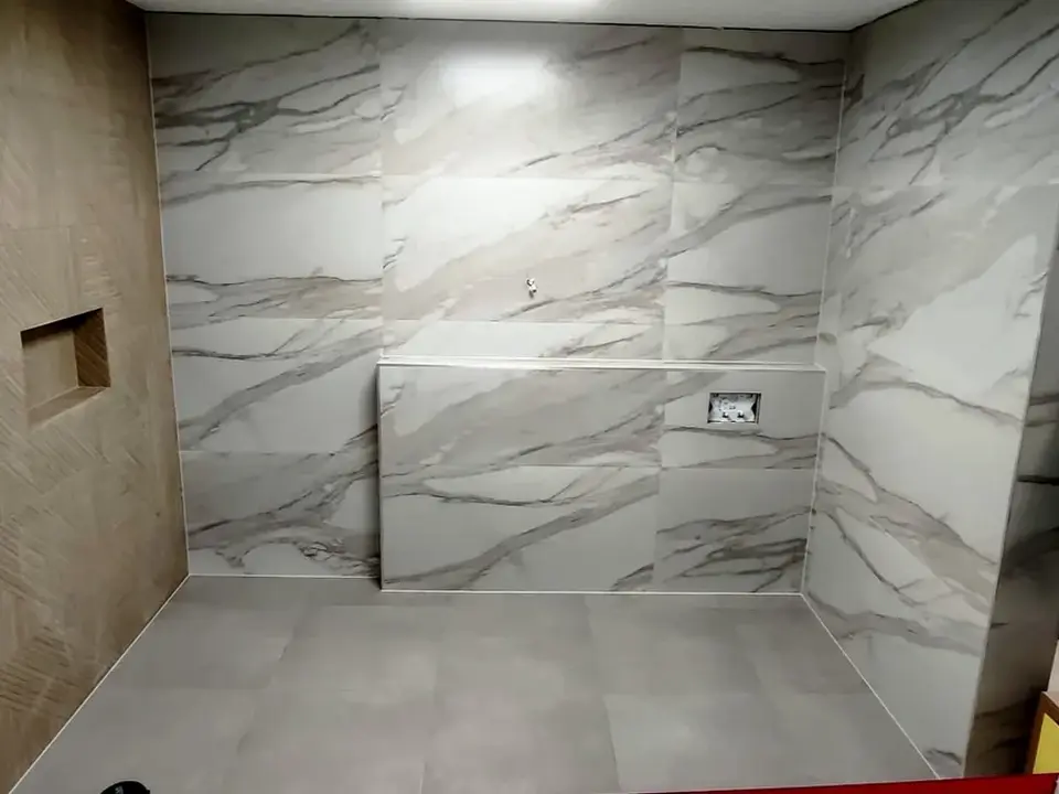 Finished contemporary walk-in shower tiling