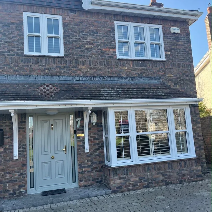 Replacement windows and entrance door project by Claxton Windows and Doors