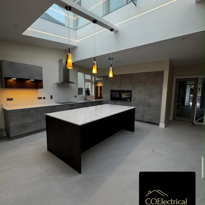 Modern kitchen with pendant lighting and recessed lighting shown in the CO Electrical project gallery