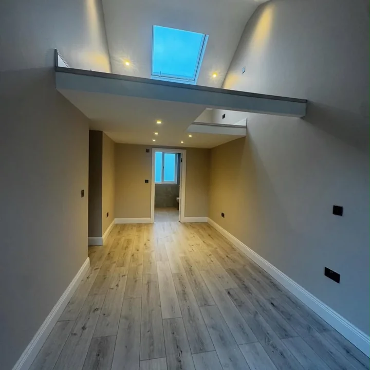 Interior hallway with recessed ceiling lighting shown in the CO Electrical project gallery