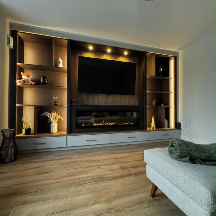 Completed living room feature wall with integrated lighting shown in the CO Electrical project gallery