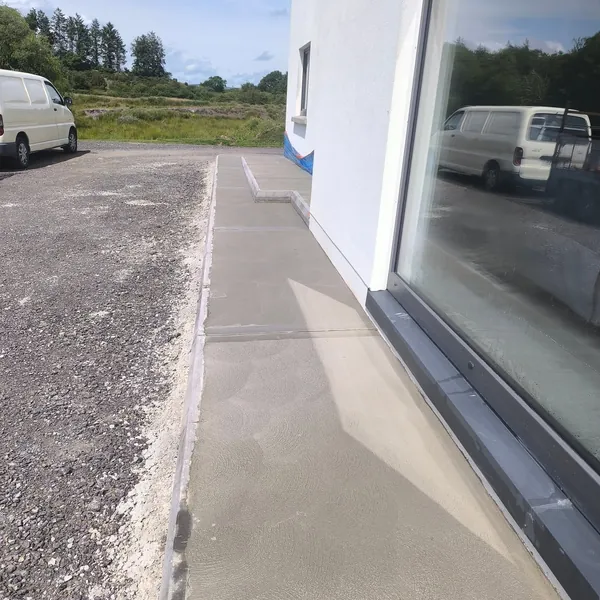Completed paved pathway and driveway edge