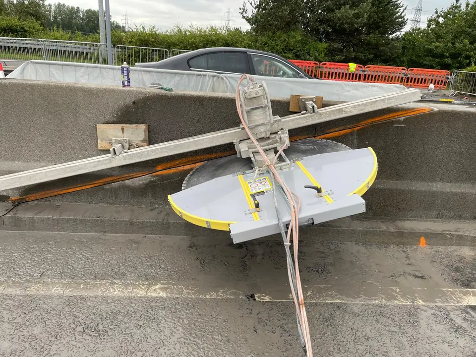 Diamond track saw positioned for a concrete wall cut