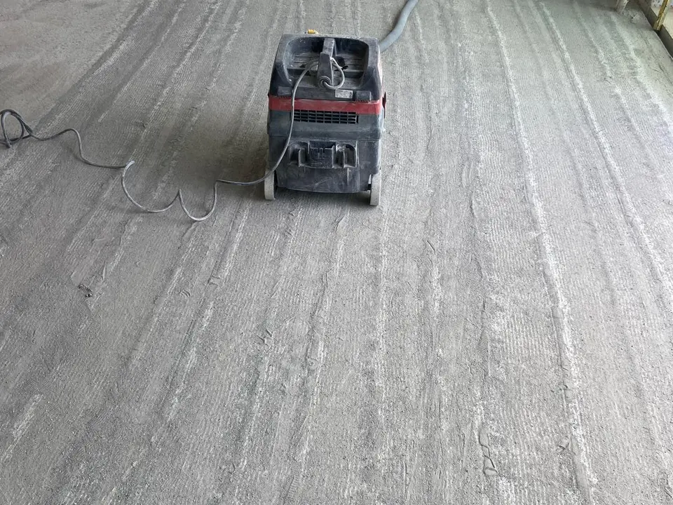 Scabbled concrete floor showing a textured bonding surface