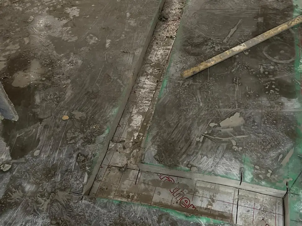 Concrete floor channels cut for utility services