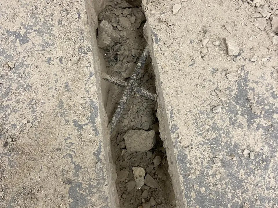 Finished chased channel through a concrete floor