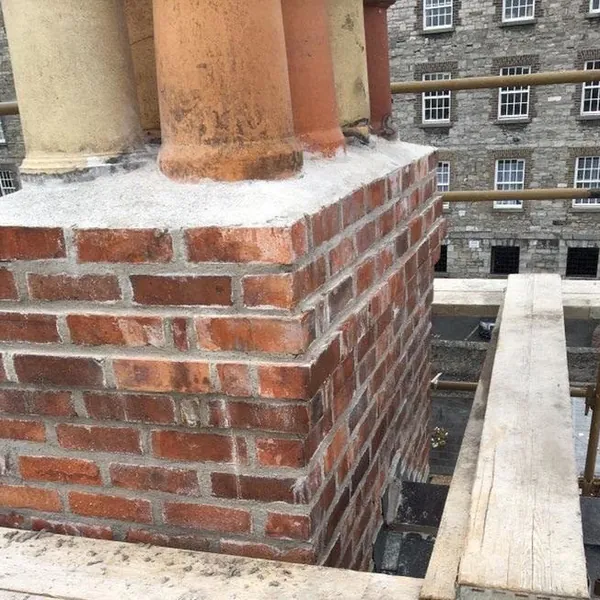 Brick chimney repaired and repointed