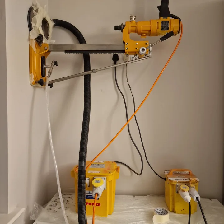 Core drilling work inside a block-built property by Derrypark Construction Ltd