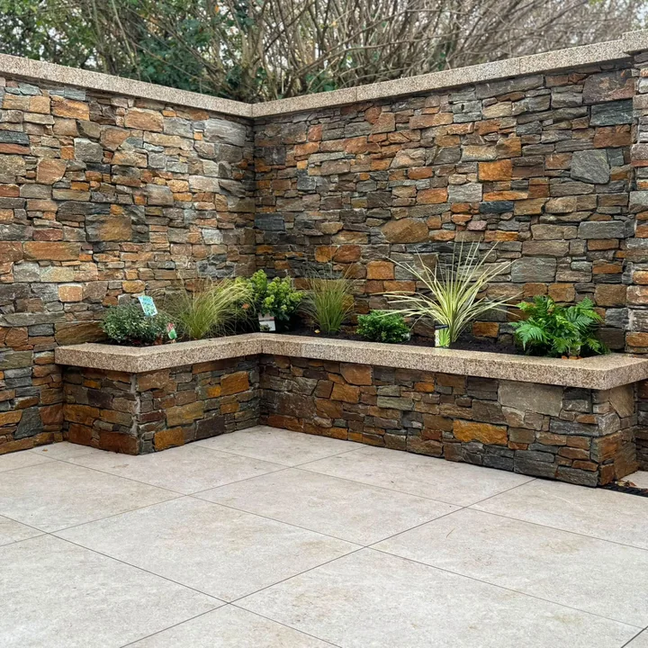 Natural stone wall and landscaping work by Edal Construction Limited