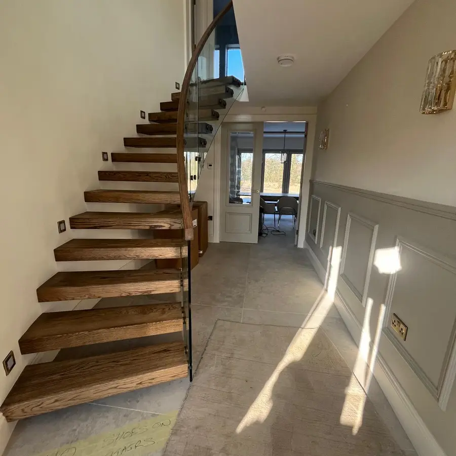 Feature staircase and hallway during interior finishing