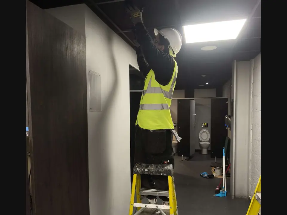 Hugh Courtney Ltd construction team working inside a project