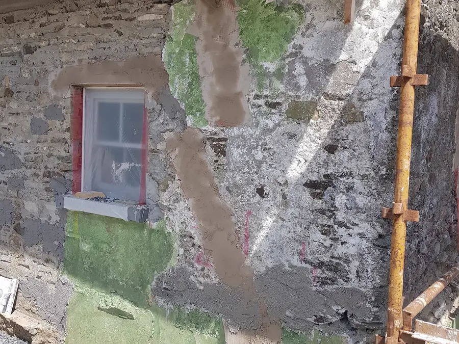 Masonry and render repair around a window