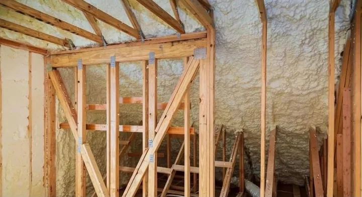 Spray foam insulation across timber roof framing — Innovate Insulation
