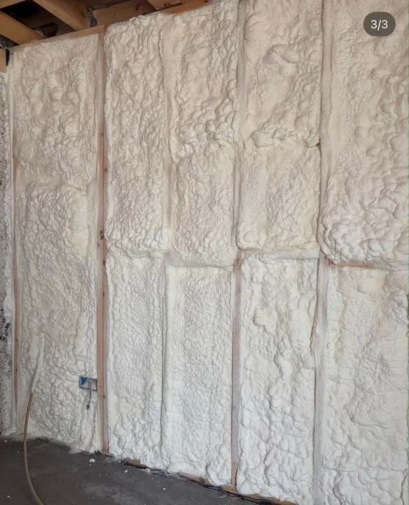 Spray foam insulation applied to a framed wall — Innovate Insulation