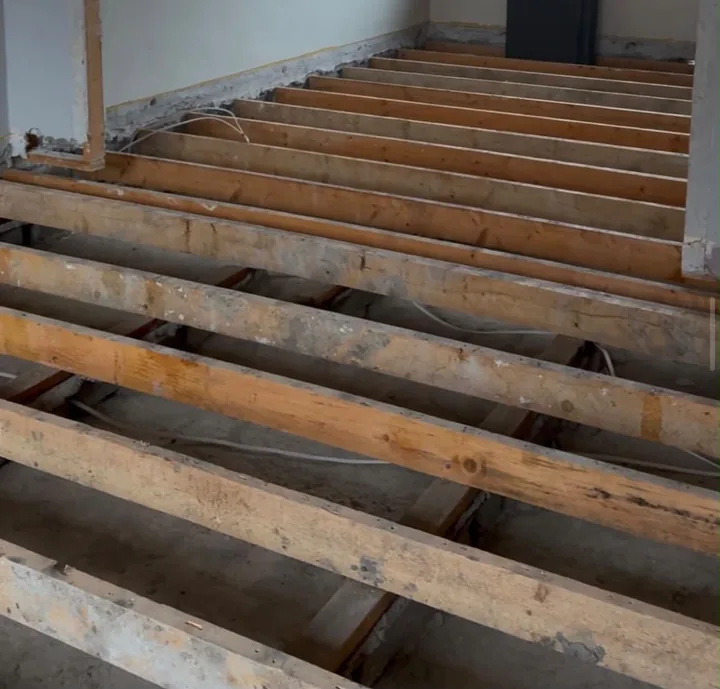 Floor joists before insulation work — Innovate Insulation
