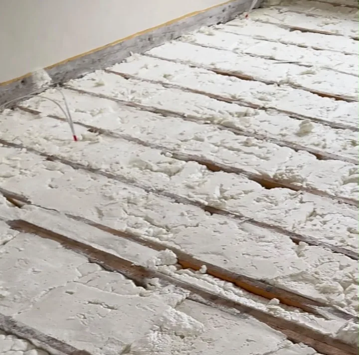 Spray foam insulation between floor joists — Innovate Insulation