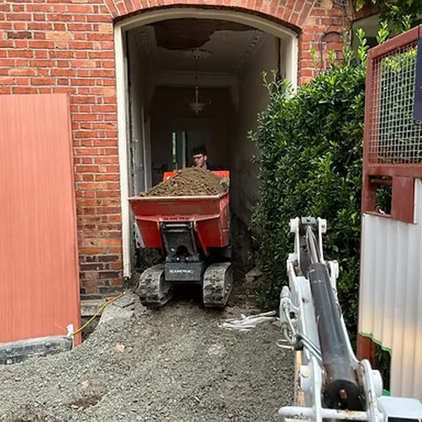 Controlled site excavation near an existing building