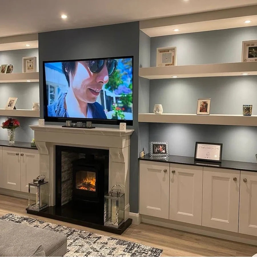 Fireplace feature wall and fitted cabinetry image from JR Fireplaces