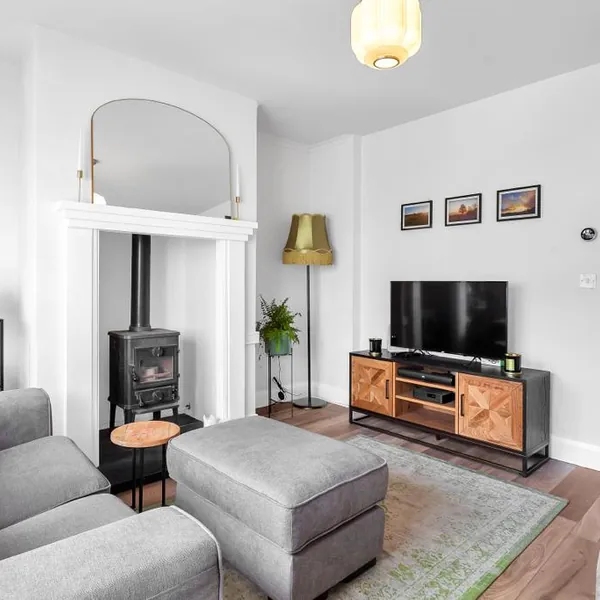 Renovated living area with fireplace