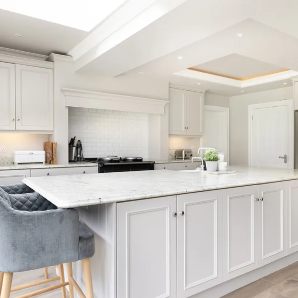 White kitchen and island in a completed Keshmore home