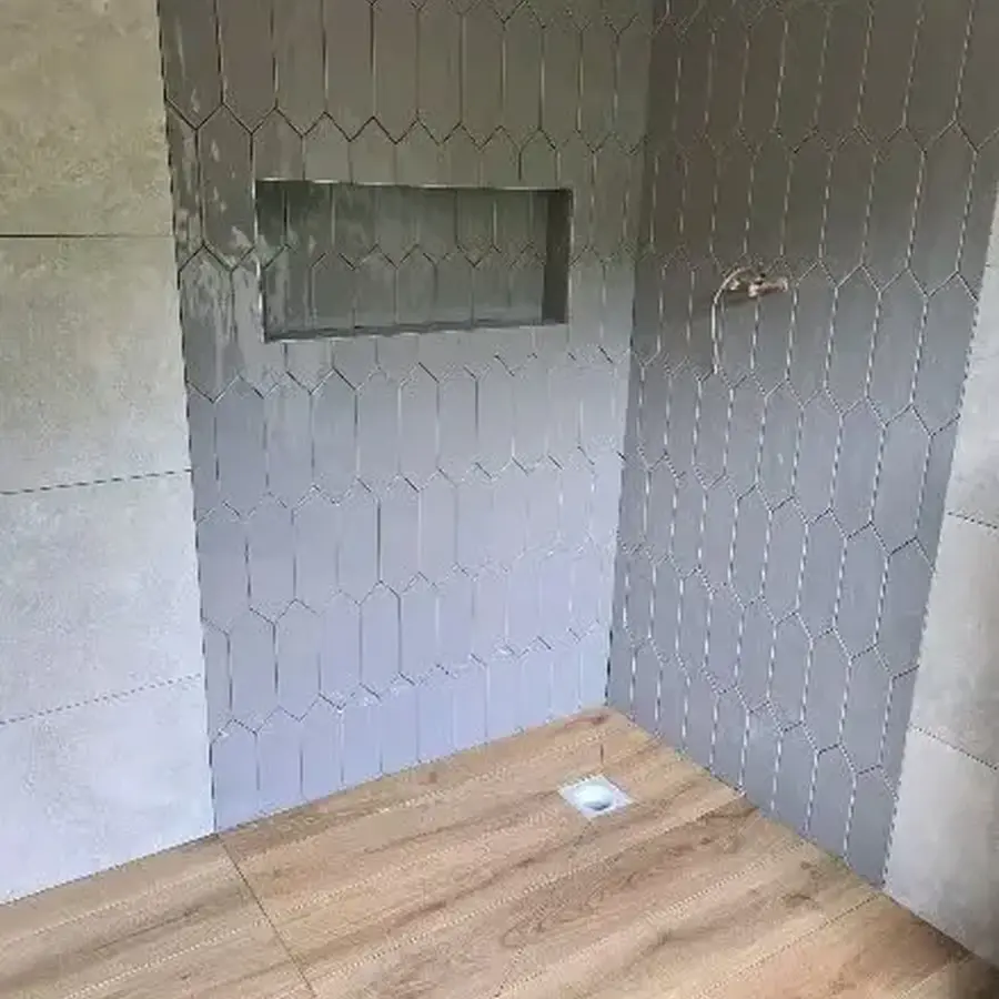 Decorative tiled shower feature wall