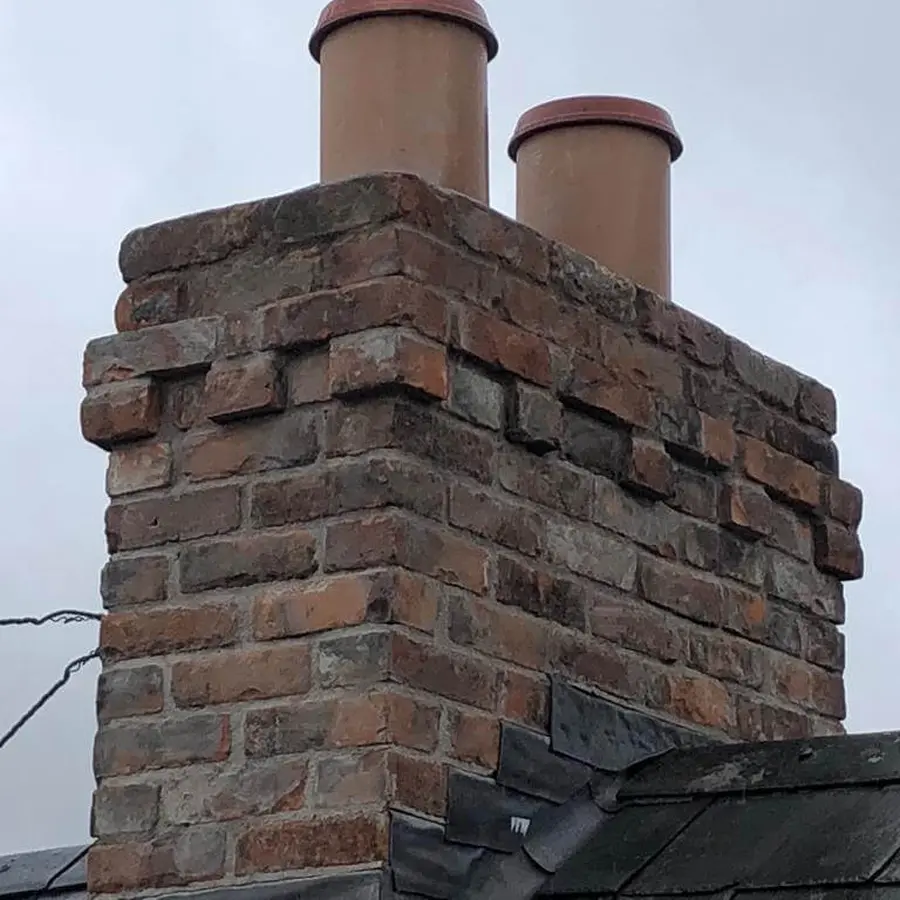 PDH Stone Masonry restored brick chimney stack at Montenotte
