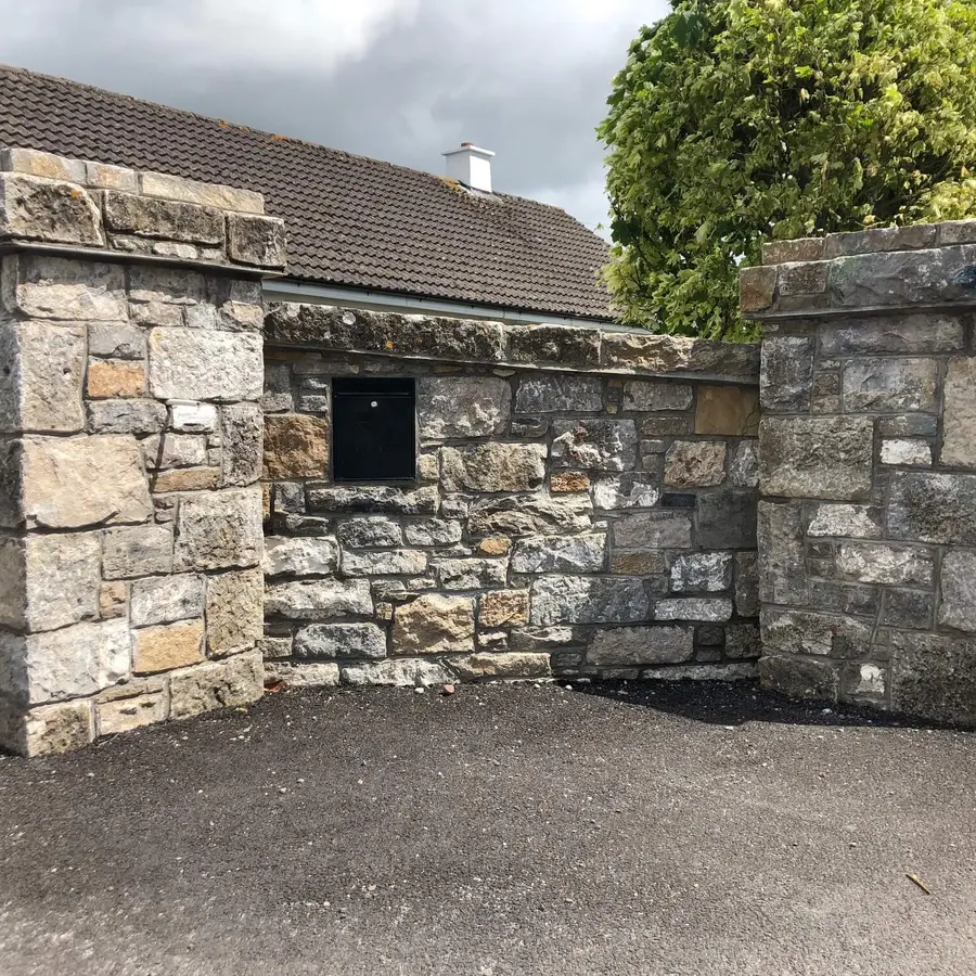 PDH Stone Masonry reclaimed limestone wall and entrance