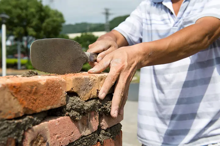 Brick repair and restoration using traditional masonry methods