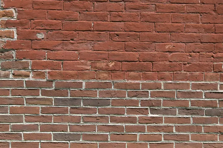 Brick wall showing repointing and restoration detail