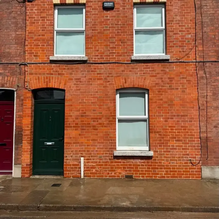 Terraced Dublin house after brick cleaning and repointing by Rigney Restoration