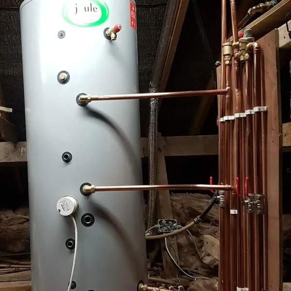 Hot-water cylinder and copper pipework installation