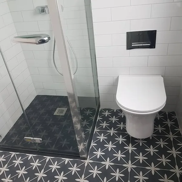 Finished bathroom with shower and toilet